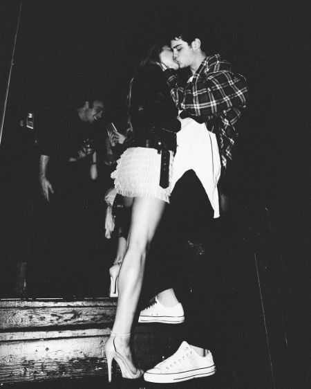 A picture of Noah Centineo and ex-lover Angeline Appel making out.